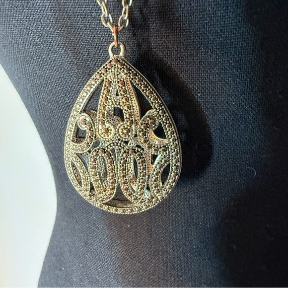 Jewelry - Silver Toned Necklace Teardrop Birdcage Pendant Reddish Hue Rhinestones Filagree